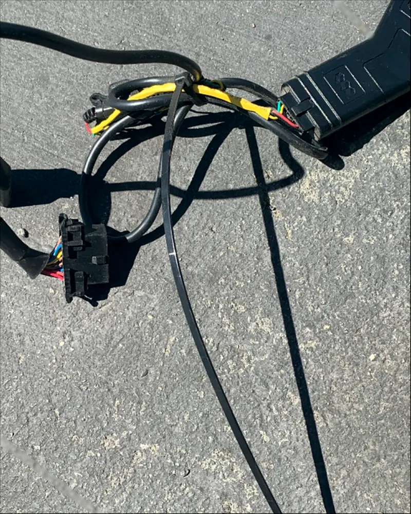 Other installer: GPS device with long uncut zip ties still attached